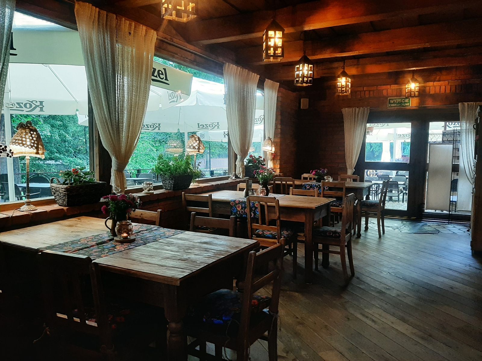 Dining room with terrace view at dusk