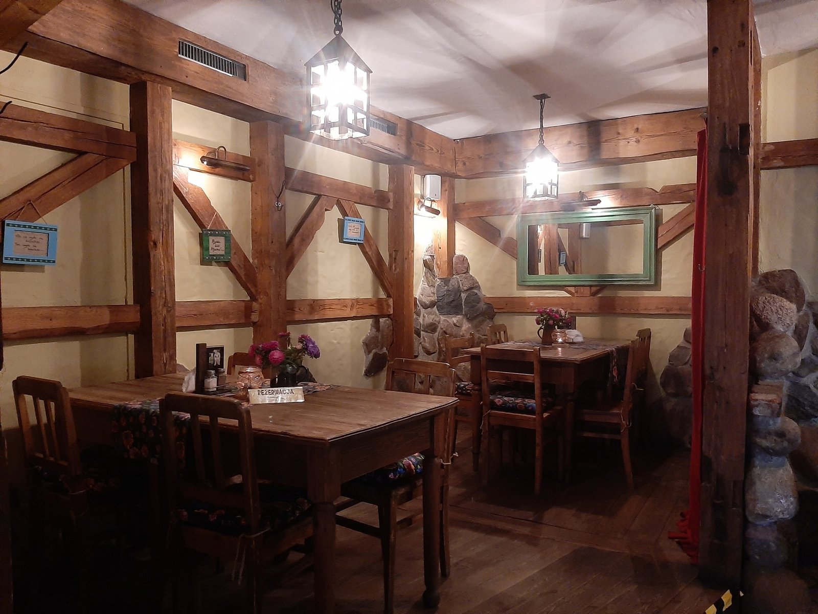 Inn interior — oak tables and timber beams